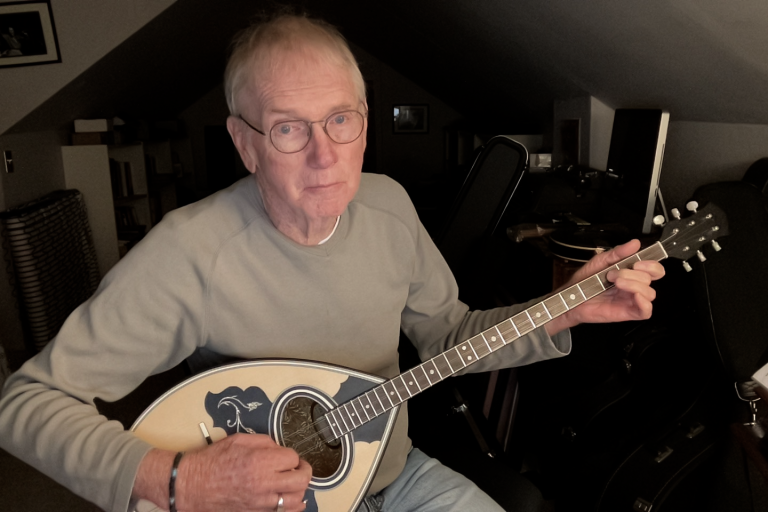 Man playing Greek bouzouki